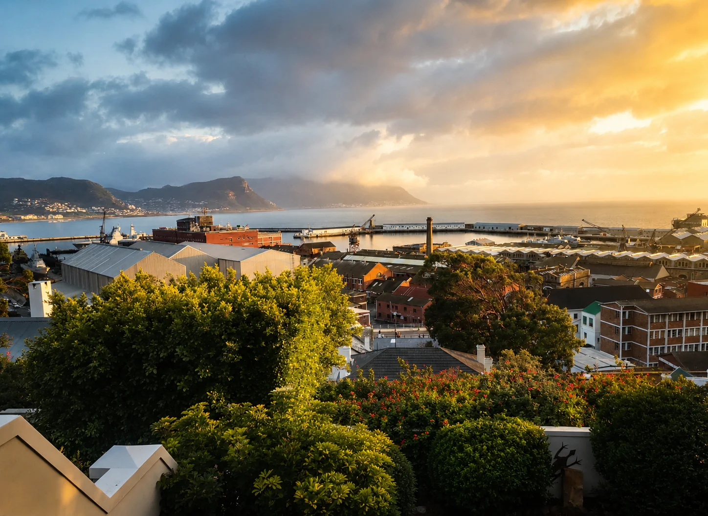 Golden light over Simon's Town harbour and False Bay